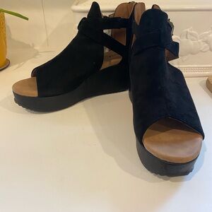 Size 9, Black suede platform shoe.